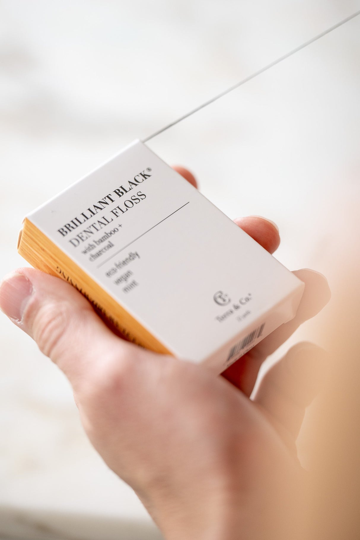 Brilliant Black® Floss – Whitens Between Teeth Naturally