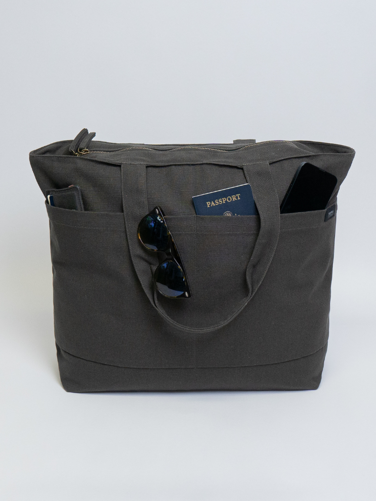 Tote bags with trolley sleeve