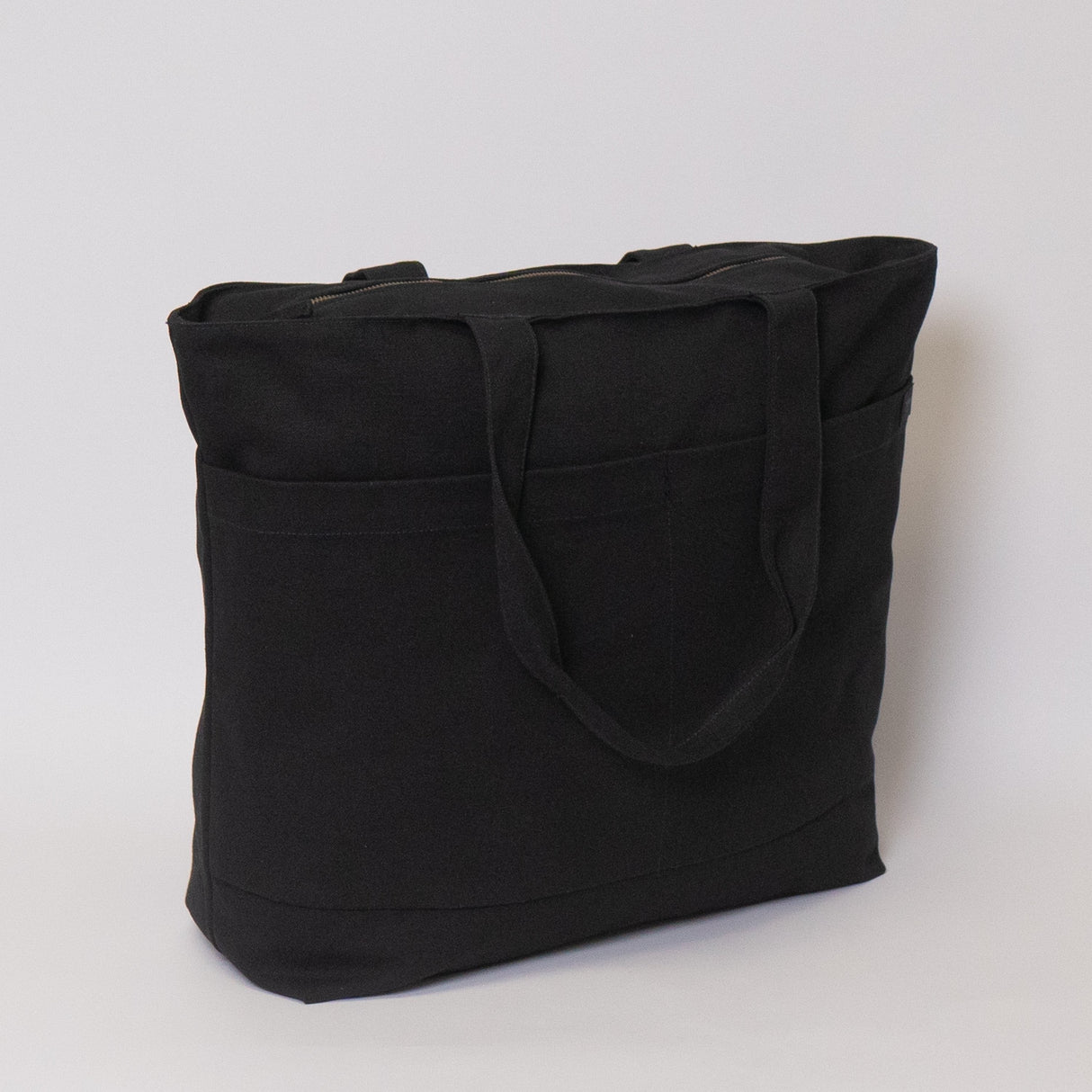 Tote bags with trolley sleeve