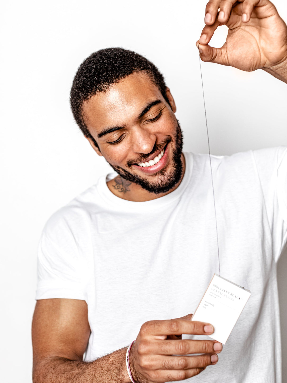 Brilliant Black® Floss – Whitens Between Teeth Naturally